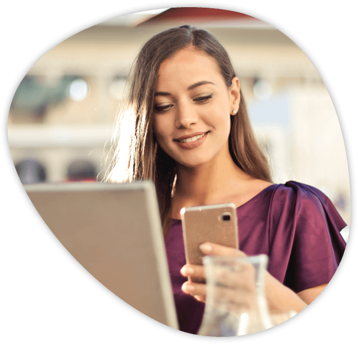 Mcon employee responding to a message on her phone